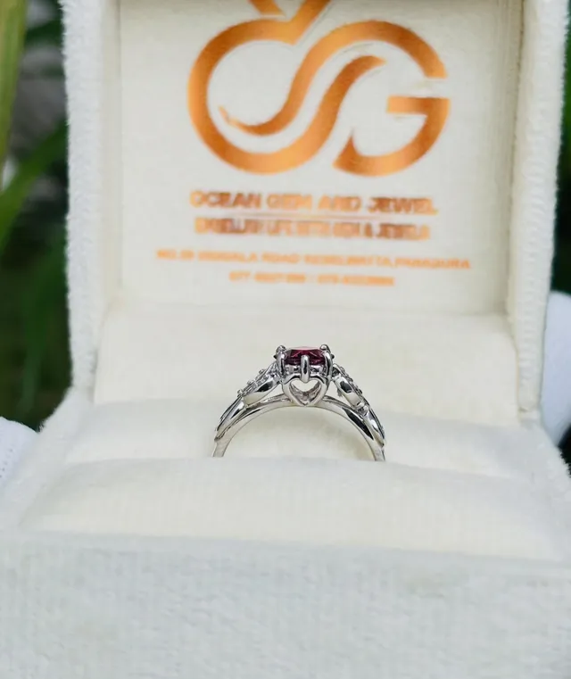 Custom pink gemstone ring in its Ocean Gem & Jewel box