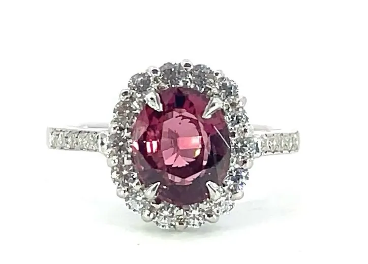 Pink garnet halo ring