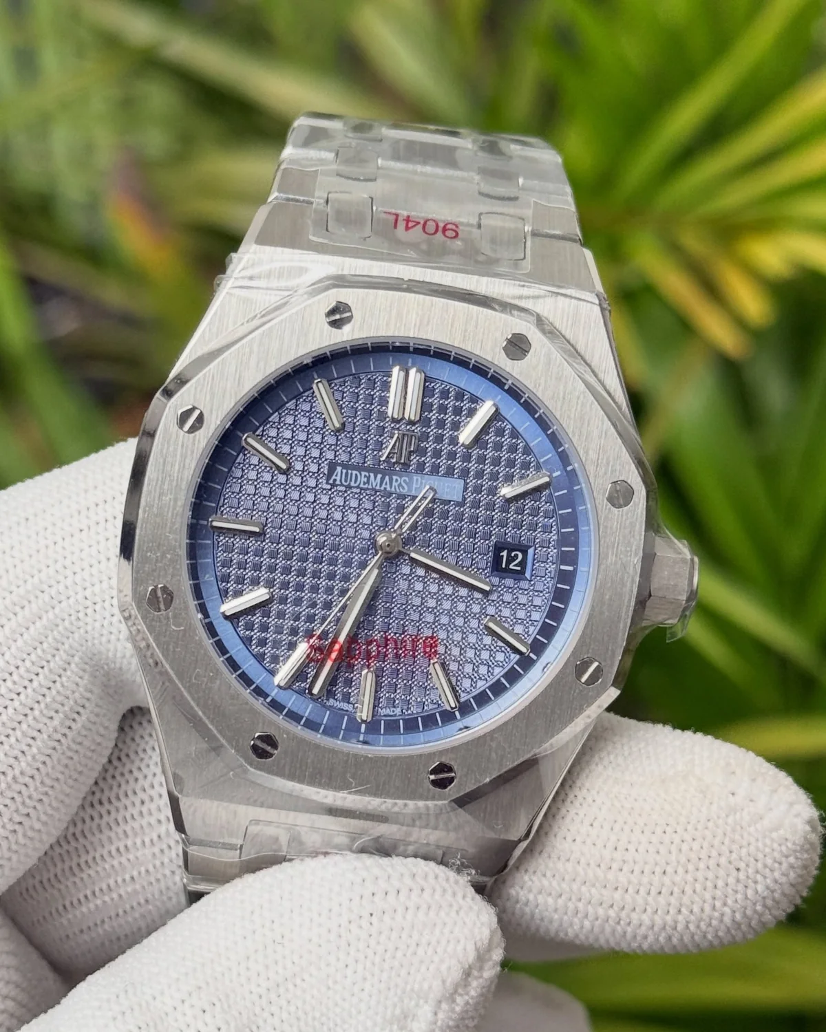 Blue-dial watch with an octagonal bezel, photographed by Ocean Gem & Jewel